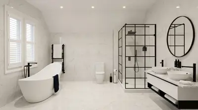 Bathroom with white marble-effect tiles, a freestanding bath, a black-framed shower screen and twin basins